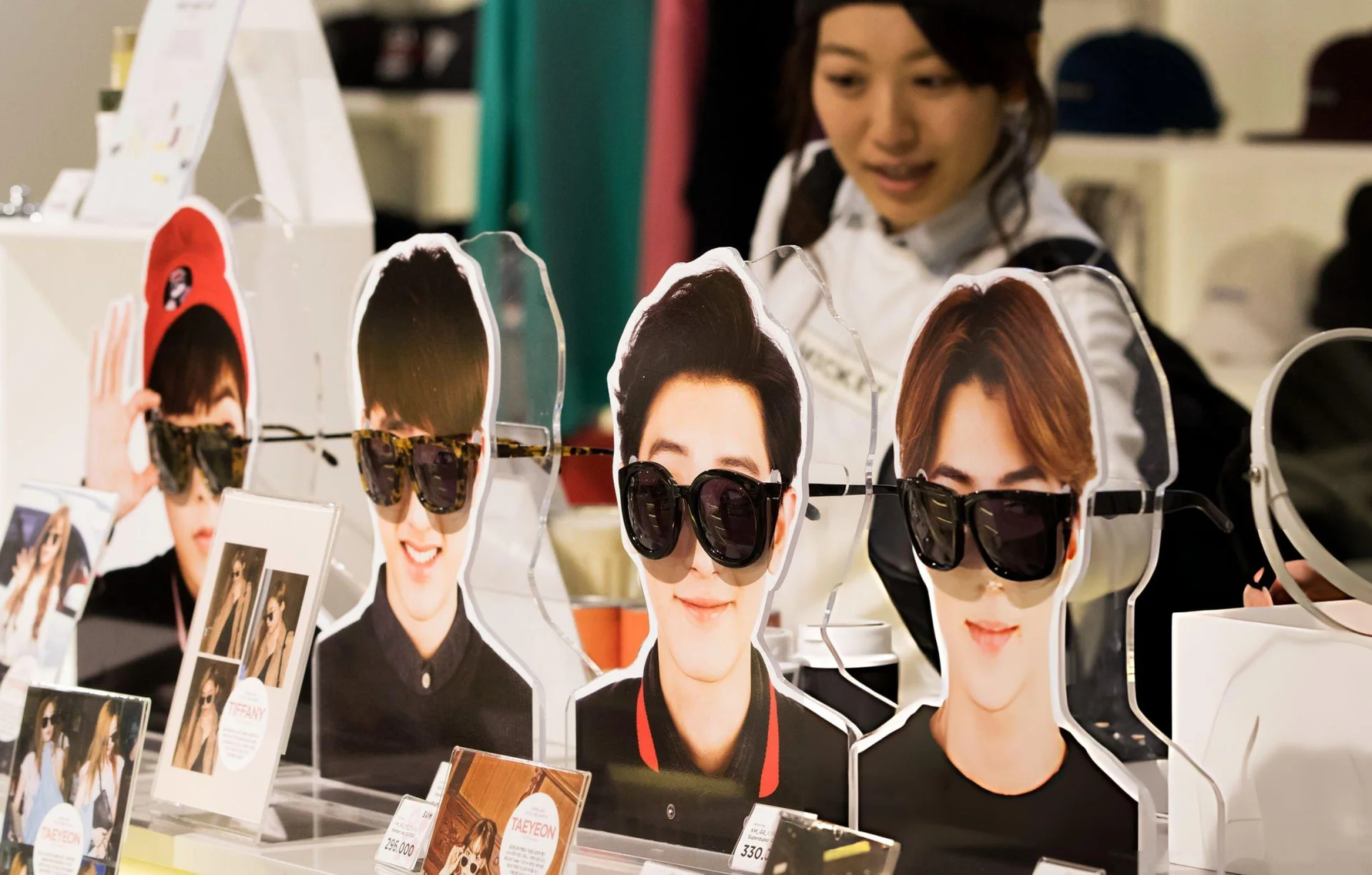 Fan display with idol placards and sunglasses